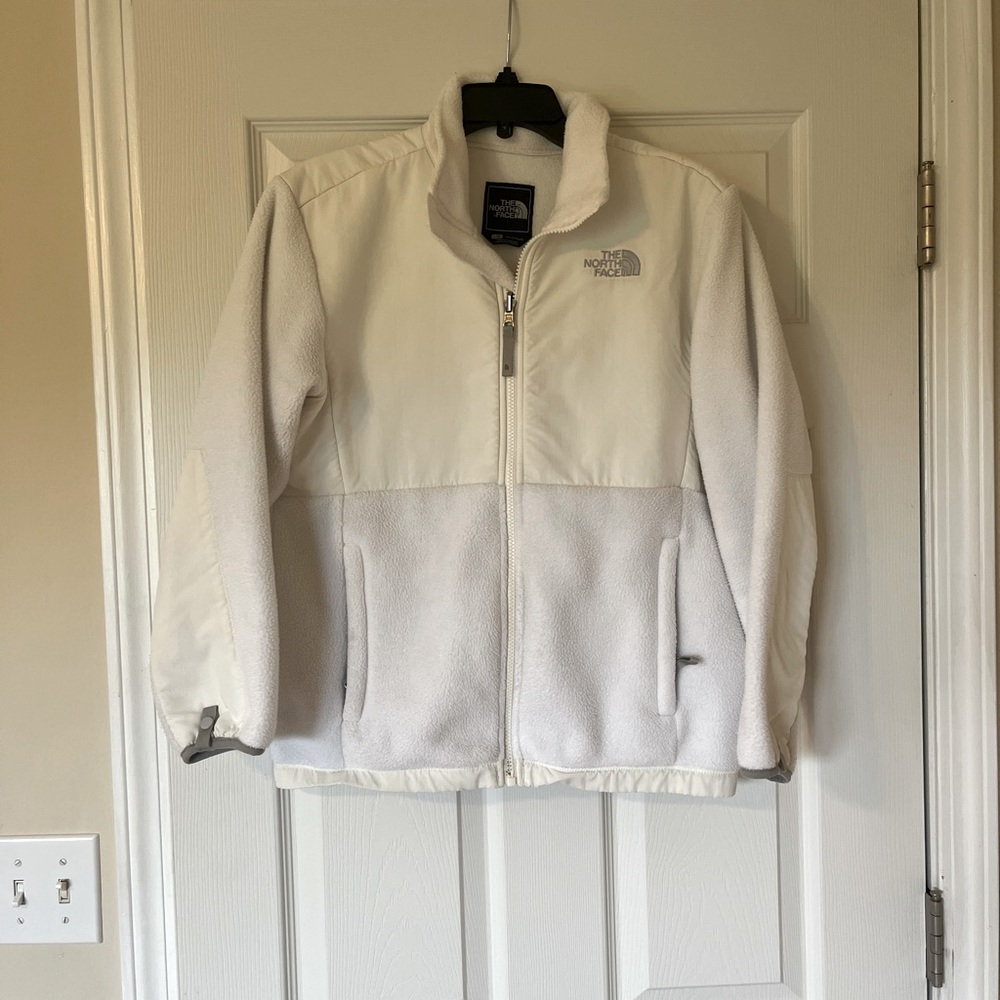 The North Face girls size large white fleece jacket
